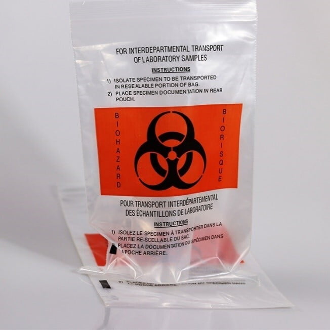 Biohazard Specimen bags used for transportation of Biohazard/lab products. Material: Plastic Thickness: 40Micron Dimension: 650x650mm Printing: 2 Color Zip Lock Closer